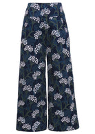 Cotton mid-wale corduroy wide leg pants with floral print on dark blue base, with pockets