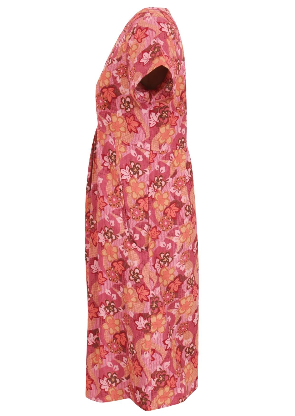 Side image short sleeved dress with pockets and V neckline.