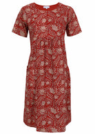Front view of cotton dress with round neckline in red based floral print