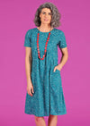 Model in Frankie Dress Going Dotty 100% lightweight cotton fully lined relaxed fit dress with pockets