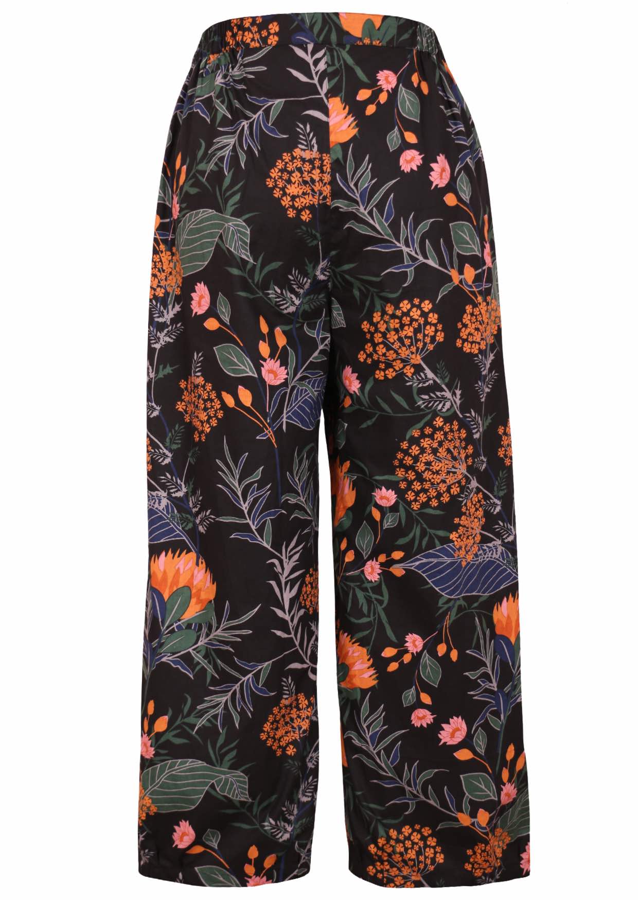 Back view of 100% cotton wide leg pants with elastic waist and pockets in black based botanical print
