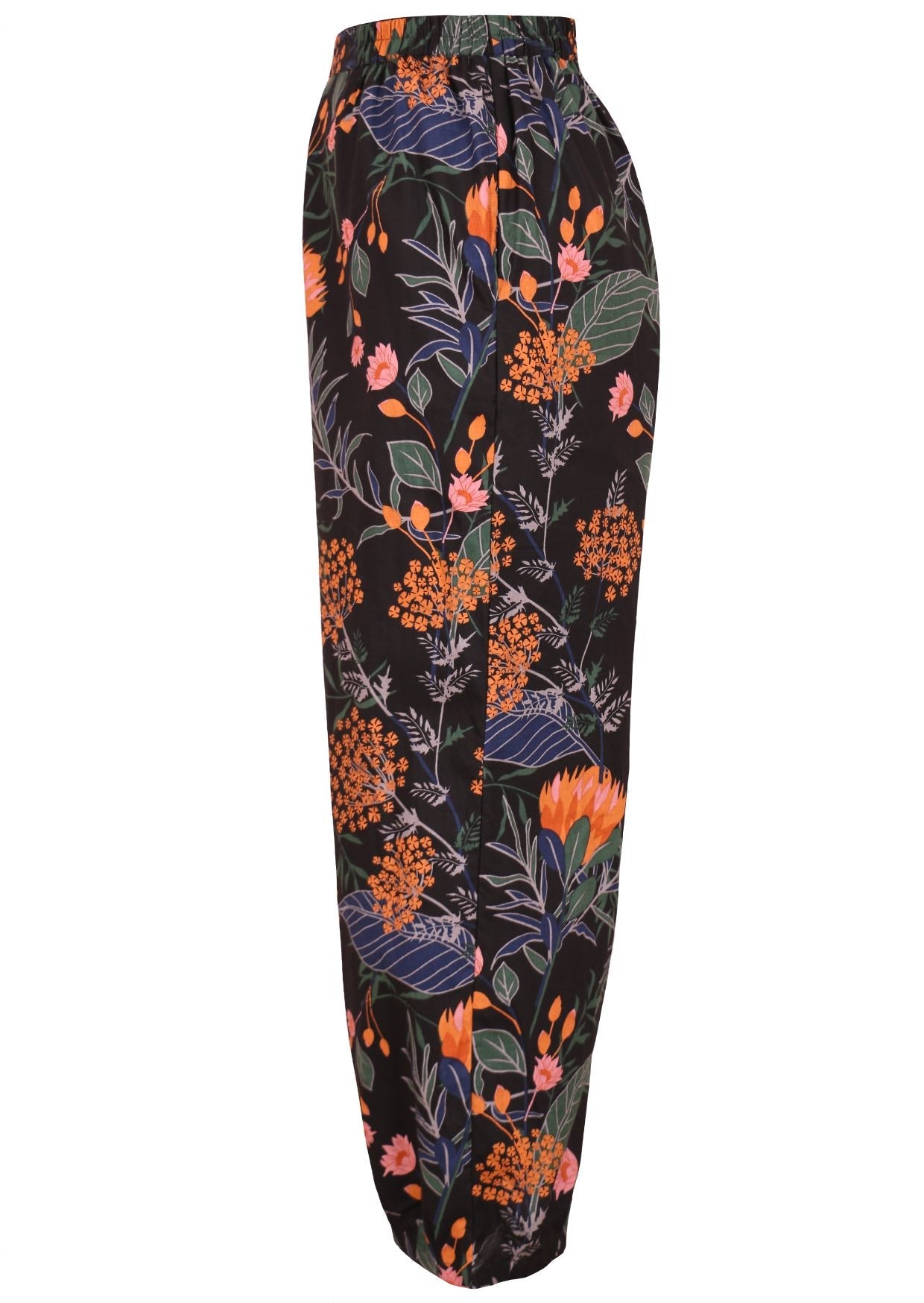 Side view of floral print wide leg cotton pants with pleated ankles, high elastic waist and pockets