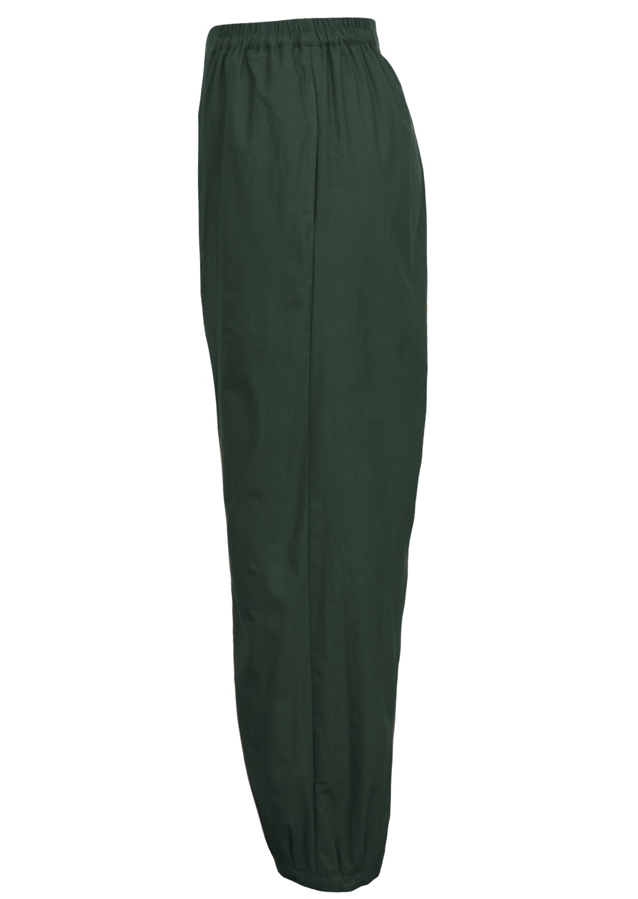 Side view of wide leg cotton harem pants in jungle green with hidden side pockets and elastic waist
