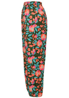 Side view of floral print wide leg cotton pants with pleated ankles, high elastic waist and pockets
