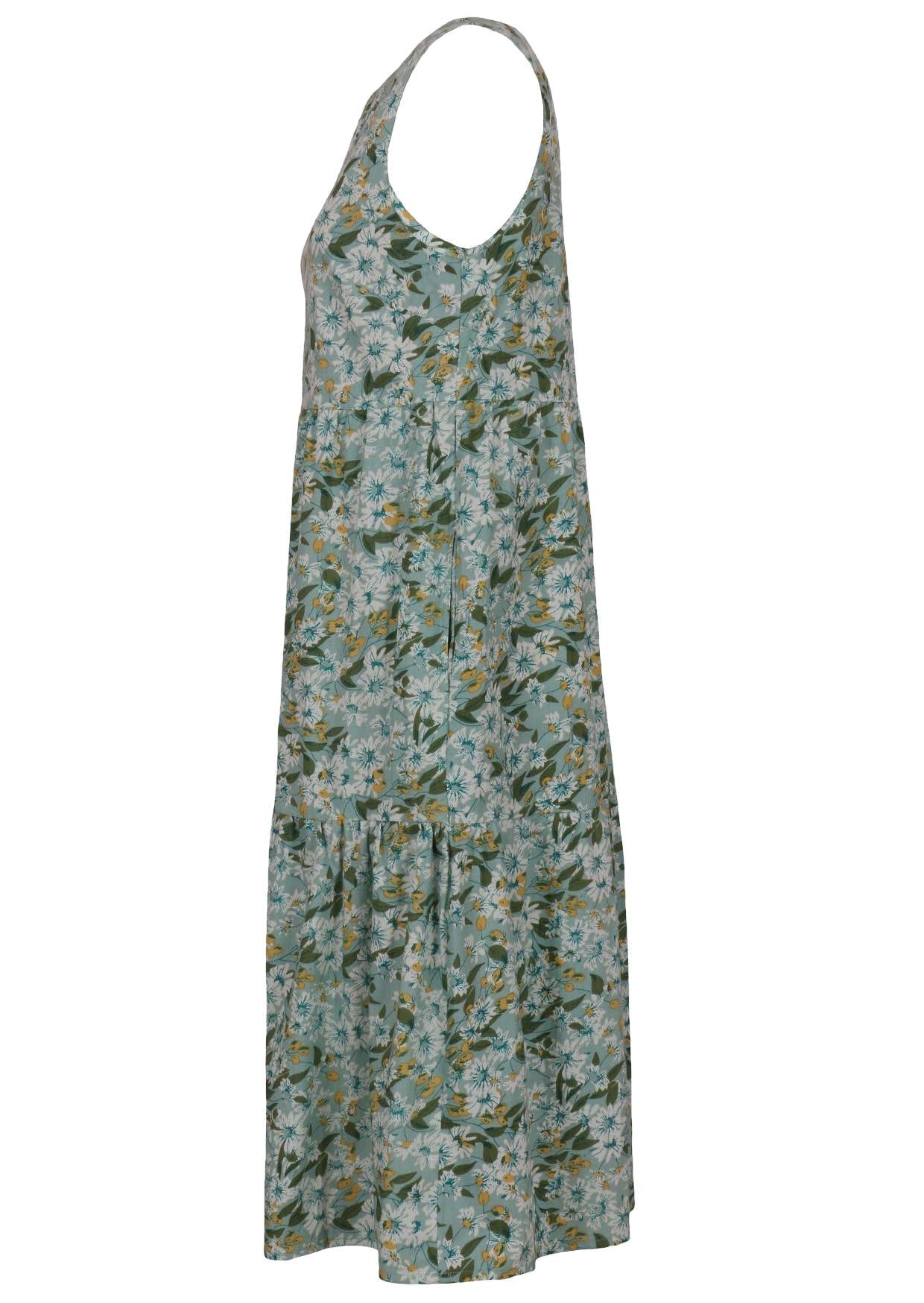 Side view of relaxed fit tiered cotton dress with sleeveless design in sage green based floral print