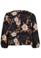 Back view of 100% cotton loose fitting top with bishop sleeves and centre back seam