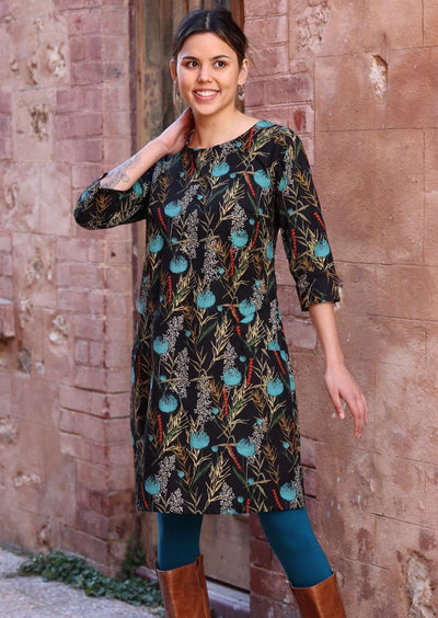 Model wears black base botanical print cotton 3/4 sleeve dress
