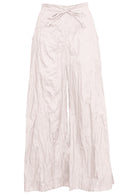 100% cotton wide leg pants in natural white with drawstring waist tie.
