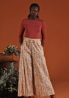 Model wears cotton wide leg pants with drawstring and pockets