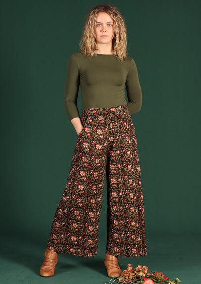 Model in Janis-Pants Wild Rose wide legged cotton women's pant with pockets