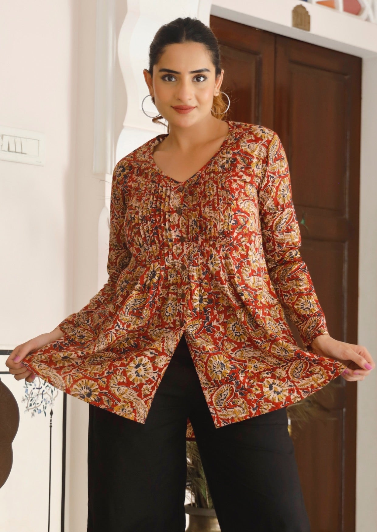 100% cotton button through top with A line flare and V neckline