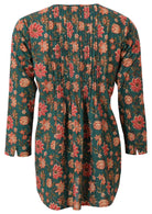 Green based floral print cotton button through shirt with long sleeves, and pin tucks across the bodice, front and back
