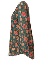 Green based floral print cotton button through shirt with long sleeves, that is longer at the back