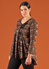 Model in black cotton blouse with v neck and button down front