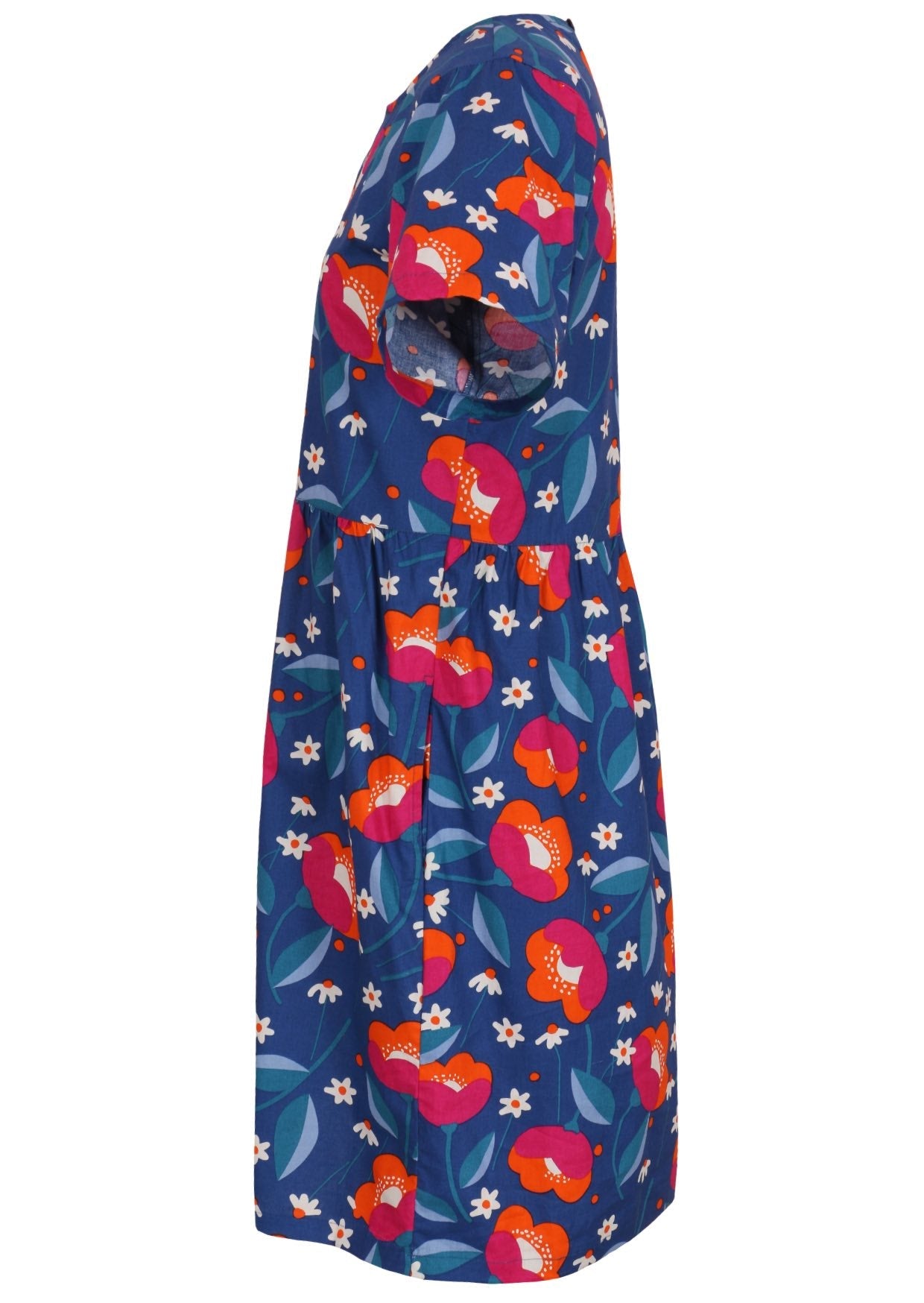 Side view of loose fitting cotton dress in royal blue with short sleeves and hidden side pockets 