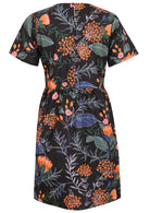 Back view of above knee length cotton dress with short sleeves and button at nape of the neck in black based lovely floral print 