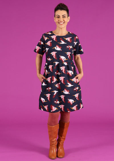 Mabel Dress Percival 100% cotton pelican print on dark blue base relaxed fit short sleeve dress with pockets | Karma East Australia