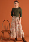 Model wears floral maxi skirt with elasticated waistband