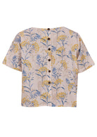 100% cotton short sleeve top with round neckline and non functional buttons down the back