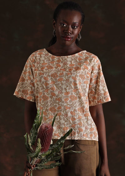 Model wears boxy cut 100% cotton floral print top
