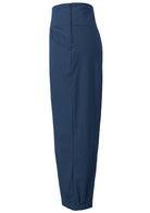 Side view of deep sea blue high waisted cotton pants with wide leg fit, side zipper and pockets 