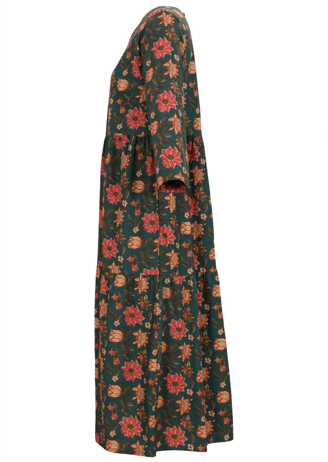 Side view of 3/4 sleeves cotton maxi dress with pockets in deep green based floral print.
