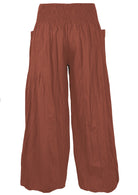 back view 100% cotton harem pants in rust shade