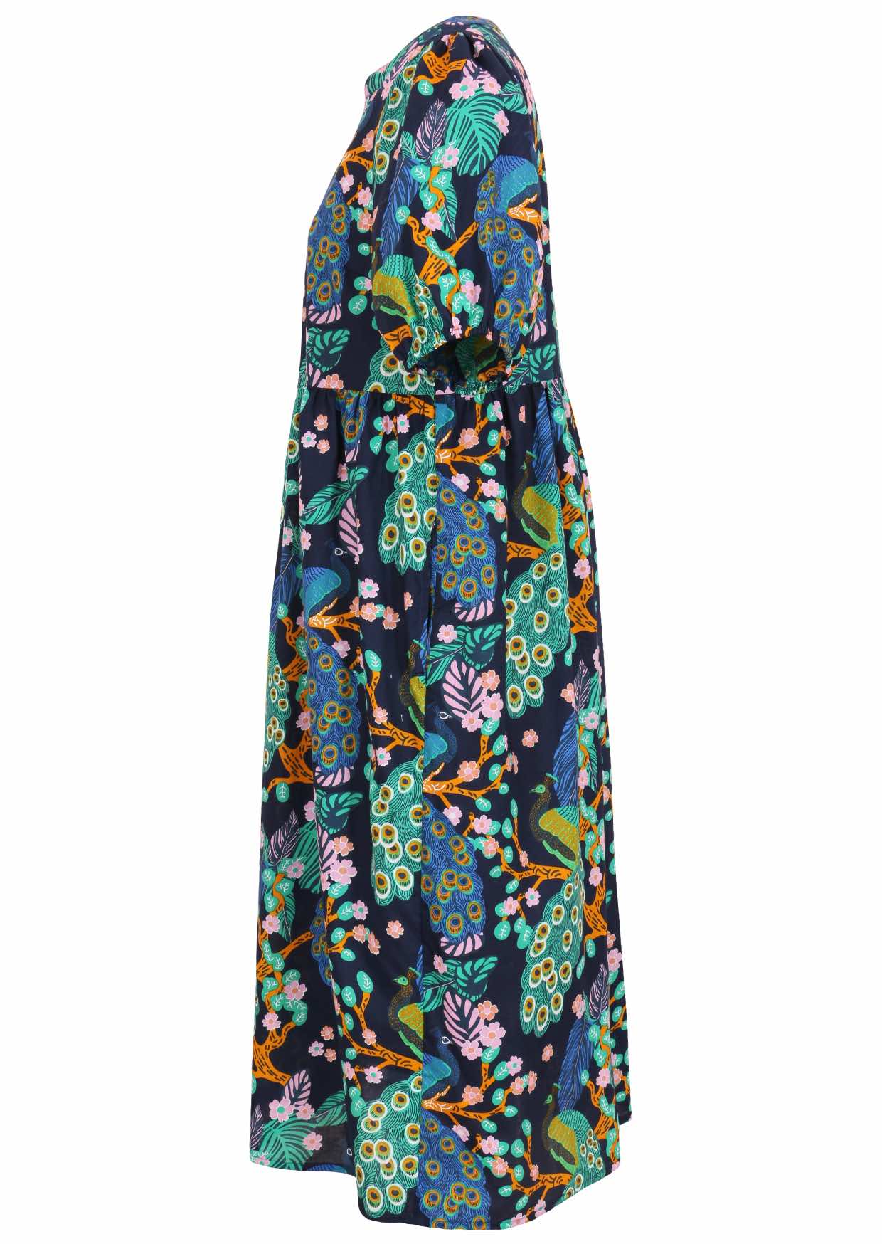 Side view of navy blue floral printed cotton midi length button through dress  with hidden side pockets.