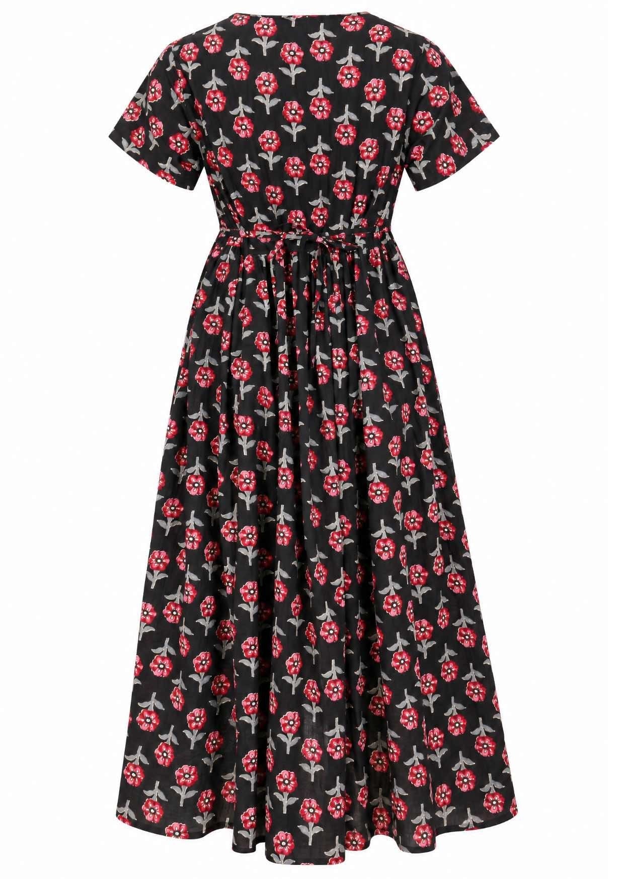 Back view of black based floral print V-neck cotton dress with pockets.