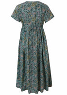 Back view of 100% cotton sage green midlength relaxed fit dress with short sleeves and shoestring tie