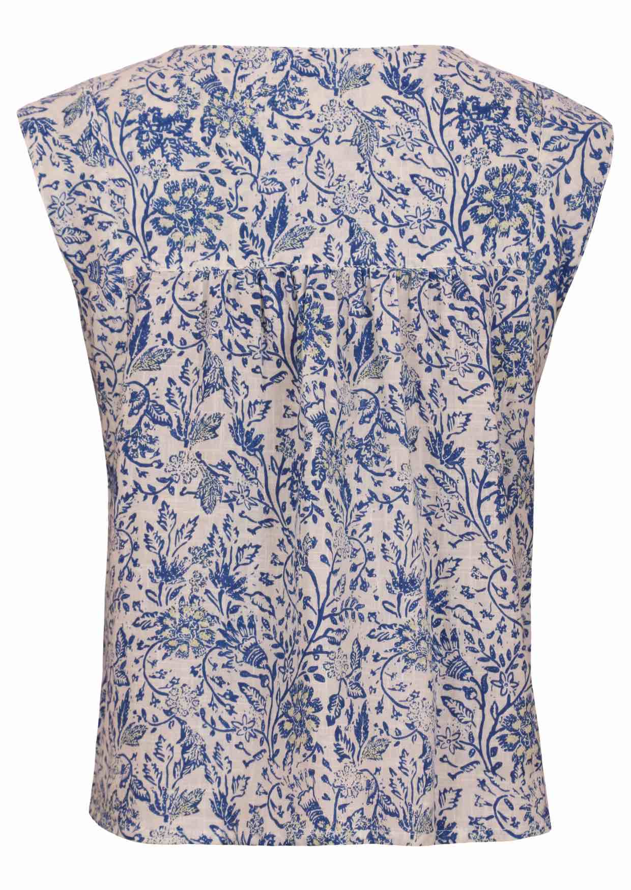 Cap sleeves top with white based blue floral print on a white background.