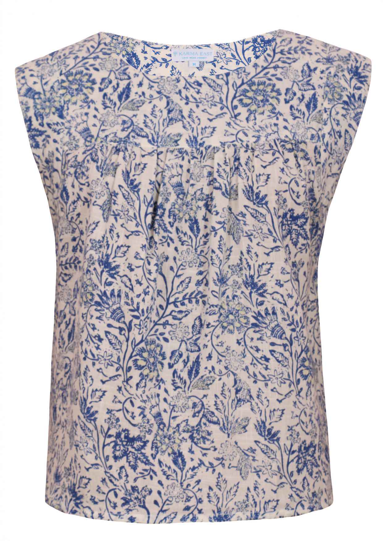 Cap sleeves cotton top with white based blue floral print on a white background.