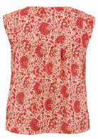 Cap sleeves top with cream based warm floral print on a white background.