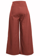 Rust coloured cotton wide-leg pants with a wide waistband