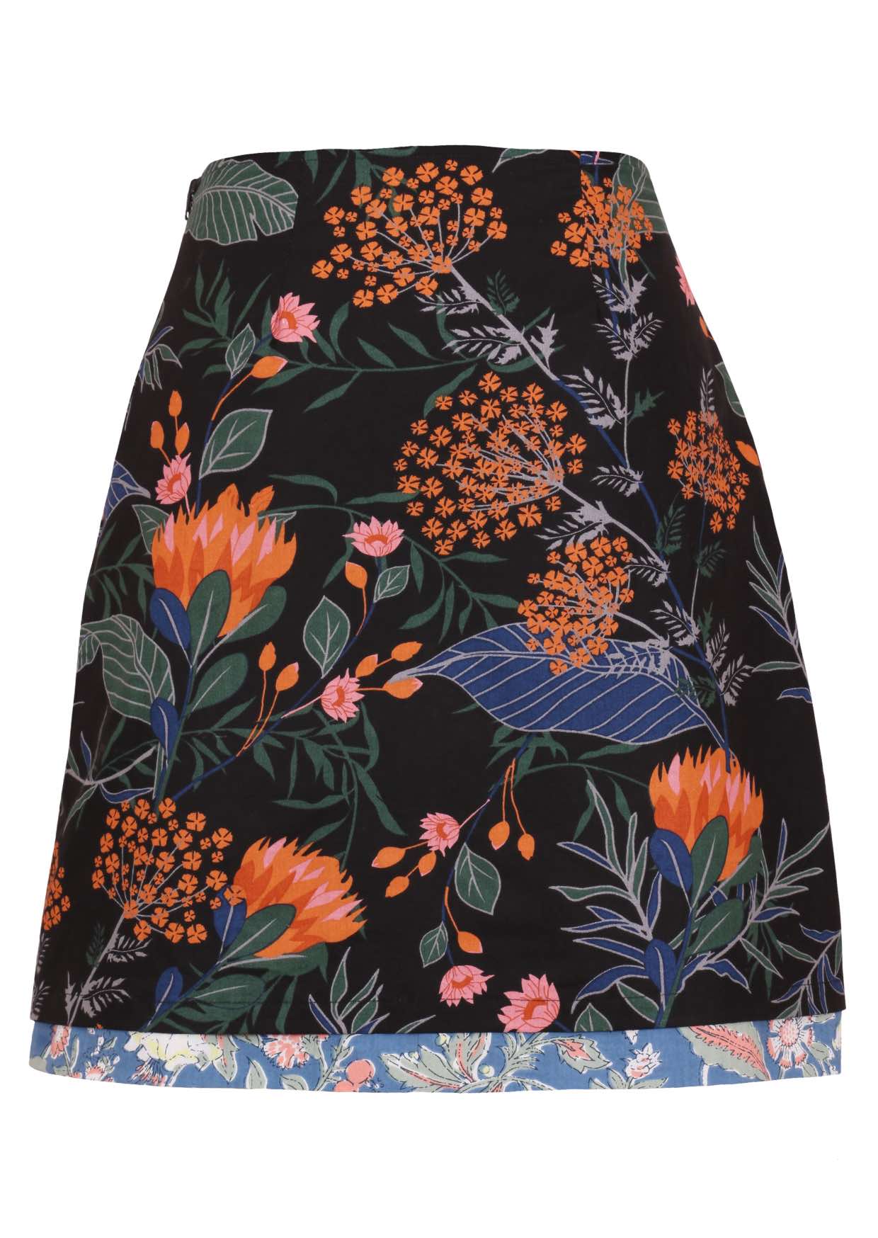 Cotton knee length reversible skirt in colorful botanic print with side zipper.