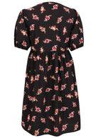Elbow length sleeve cotton dress with black based floral print.