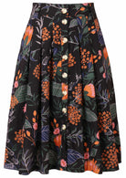 100% cotton knee length button through skirt with box pleats and belt loops in black based botanical print