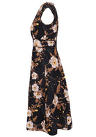 100% cotton knee length retro style dress in black based florals with cap sleeves and a deep front pockets