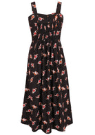 Back view of black based floral sleeveless dress with pockets and elasticated back