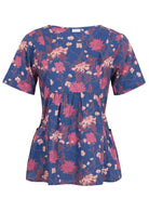 Loose fitting 100% cotton top with short sleeves, round neckline, gathers under the bust and pockets