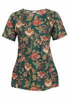 Relaxed fit 100% cotton top in bottle green based floral print with short sleeves, pockets and gathers under the bust