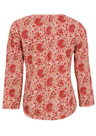 Back image of long sleeve cotton top with cream based floral print.