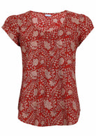 Red based floral print cotton top with U-shaped neckline.