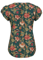 Back view of green based floral print cotton top on a white background.