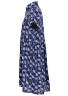 Side view of clematis print on dark blue base cotton relaxed fit collared short sleeve dress with hidden side pockets