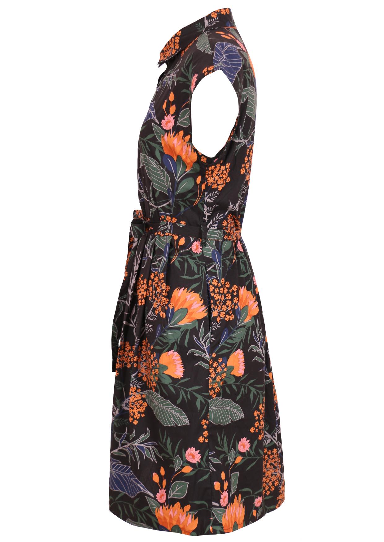 Side view of black shirt style cotton dress in botanical print with pink, orange, blue and green accents