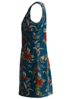 Side view of deep teal based multi-coloured floral print cotton velvet sleeveless tunic with pockets and side zip