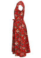 Side view of 50's style cotton button through midi length dress with a waist tie and hidden side pockets