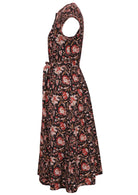 Black based traditional Indian floral print cotton dress with pockets.