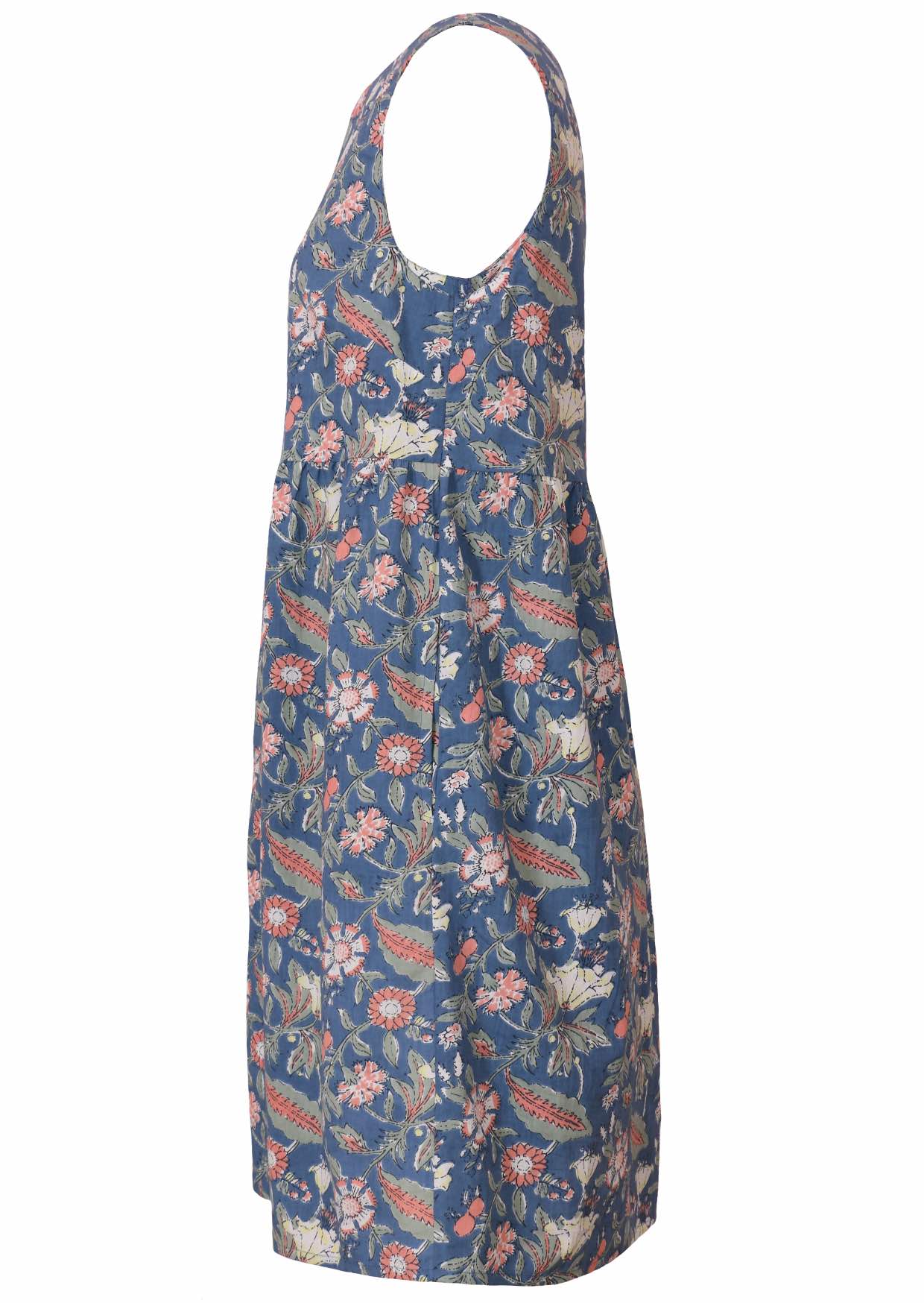 Side view of above knee length sleeveless cotton dress with hidden side pockets in dusty blue based sweet floral print 